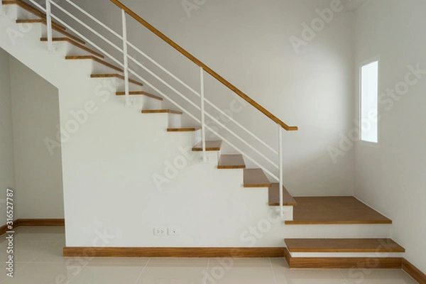 Fototapeta interior view of with  wooden stairs elevation in house. 