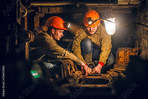 Fototapeta Two miners in the mine