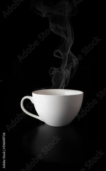 Fototapeta White porcelain cup on black background with steam