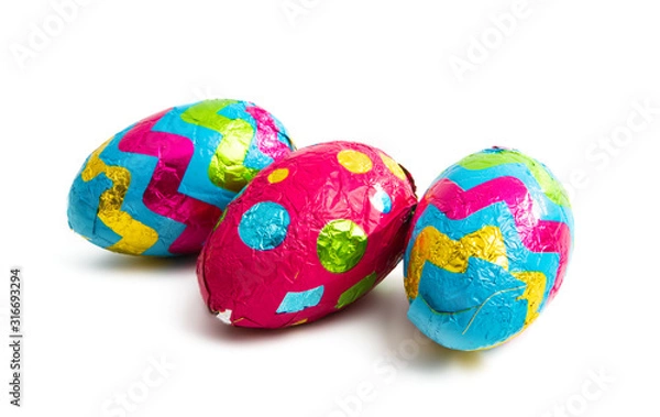 Fototapeta chocolate egg in easter foil