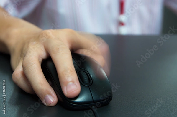Fototapeta hand holding computer mouse