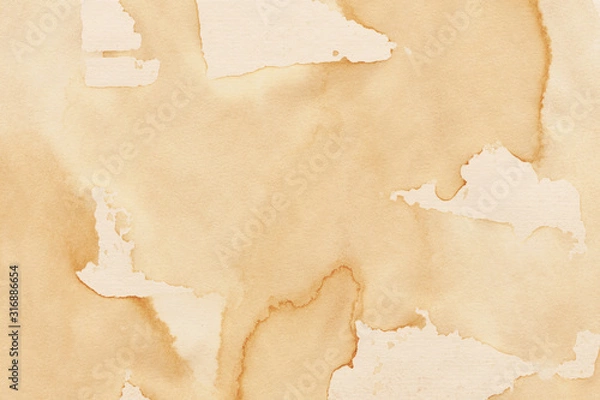 Fototapeta Vintage and old looking coffee cup stain background. Painted with a tea retro texture. Grunge paper for drawing. Ancient book page.
