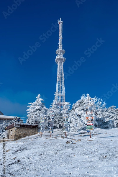 Fototapeta The snow-capped peak of Mount Mashuk