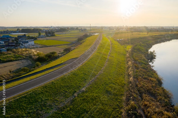 Obraz 夕暮れのサイクリングロード　群馬県館林市　渡良瀬川 河川敷