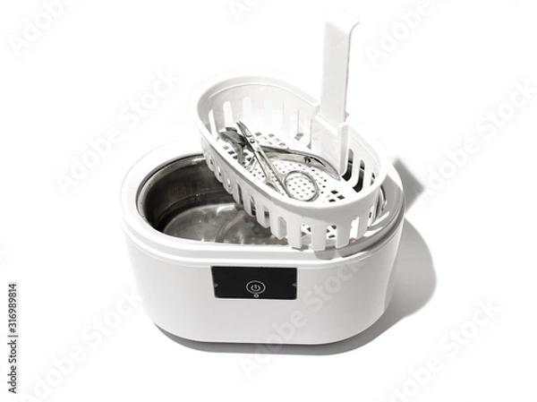 Fototapeta Cleaning systems for medical instruments. Ultrasonic cleaner on white background