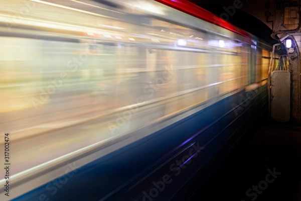 Fototapeta Motion blur, speed of the train in subway, abstract background