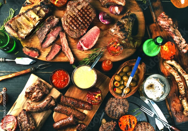 Fototapeta Assorted delicious grilled meat with vegetables