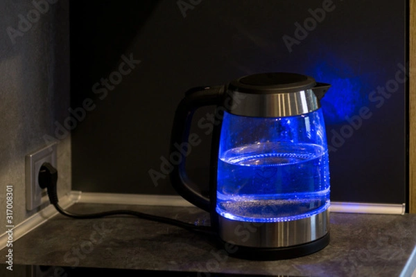 Obraz  Electric kettle boils in the kitchen