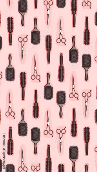 Fototapeta Flat lay composition with hairdresser set on pink background. Barber set with tools and equipment: scissors, combs and hairclips. Hairdresser and beauty salon service. Seamless pattern