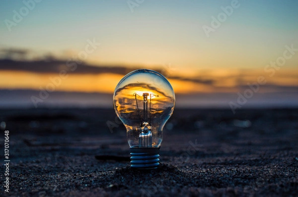 Obraz light bulb on the beach