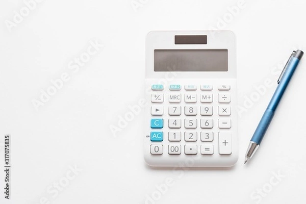 Obraz 白背景の電卓とボールペン