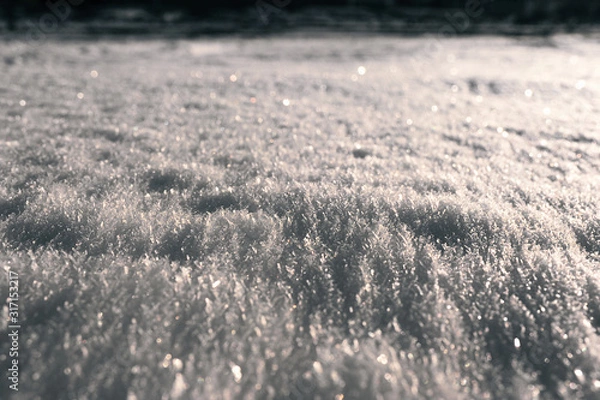 Obraz unusual snow cover of white color consisting of fluffy snow and crystallized ice on top, ice land cover in winter