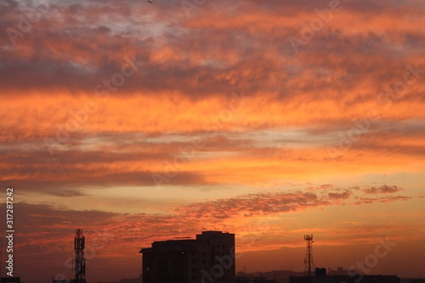 Obraz sunset over busy city