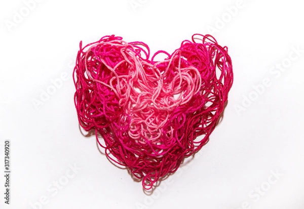 Obraz Pink heart from threads on a white background Valentine's Day banner