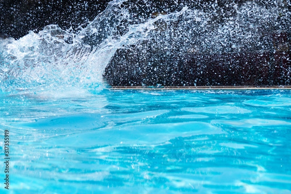 Fototapeta Lots of splashes in the pool