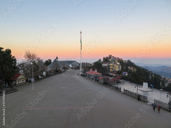 Fototapeta Sunrise at the empty Ridge in Shimla, India