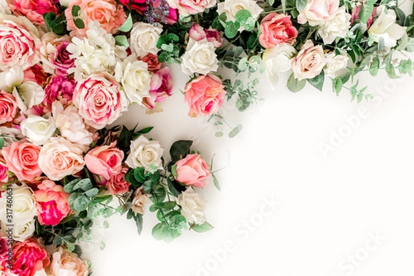 Fototapeta Flower pattern made of pink, beige roses flower buds on white background. Flat lay, top view.