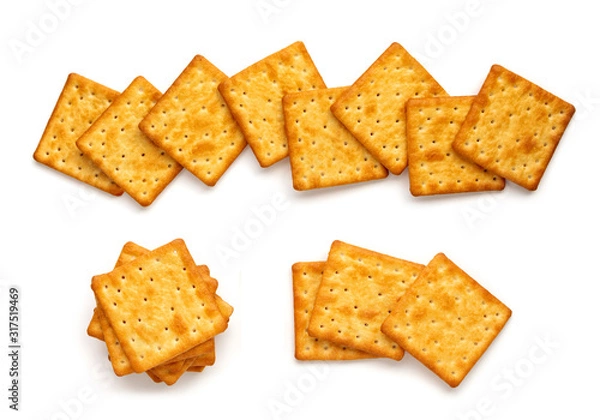Obraz Crushed dry cracker cookies isolated on white background.