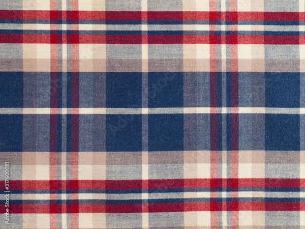 Obraz  fabric with a checkered pattern of blue, red, white. close-up