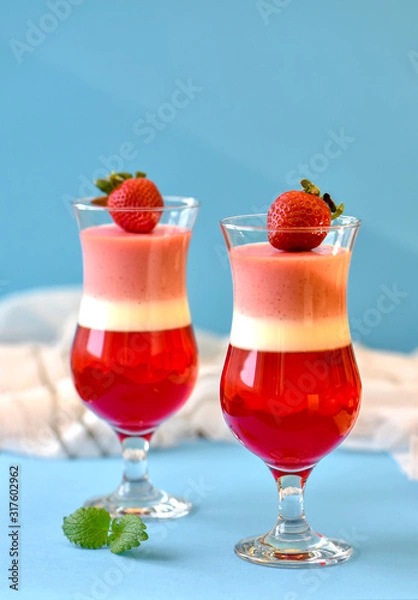 Fototapeta Panna Cotta with strawberries with copy space