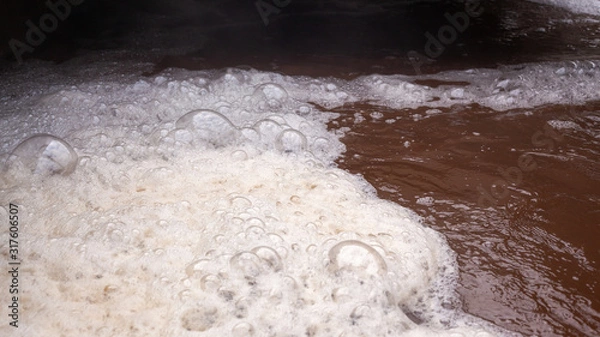 Fototapeta Active wastewater bubbling