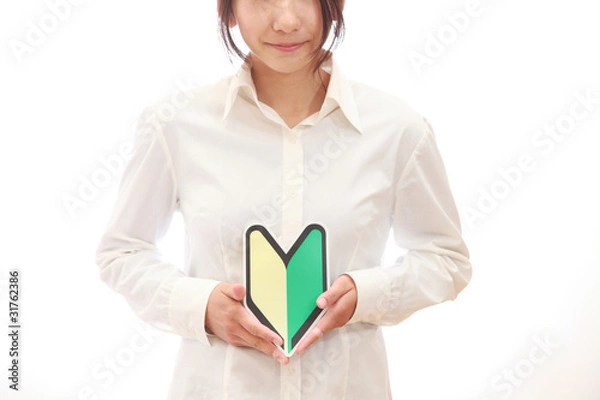 Obraz 若葉マークを持った女性