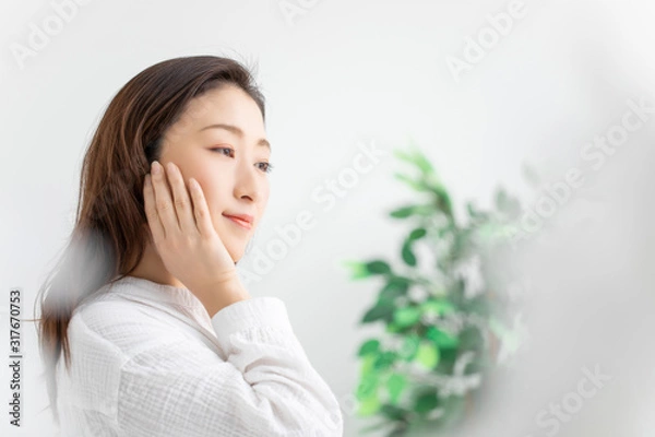 Fototapeta スキンケアする女性