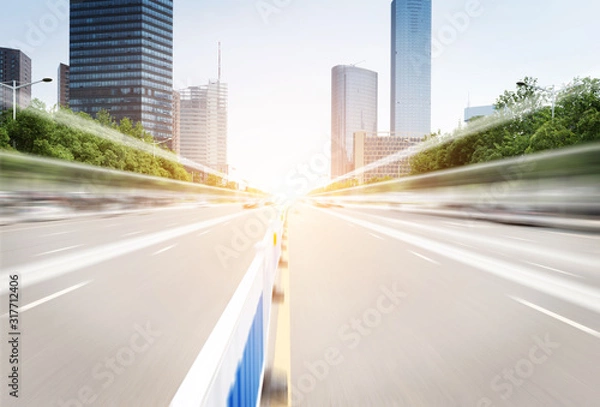 Obraz road in city with sunset