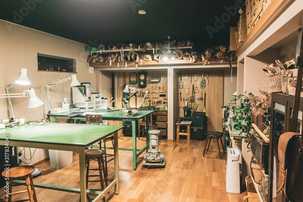 Fototapeta Working space and tools for leather craftsmen.