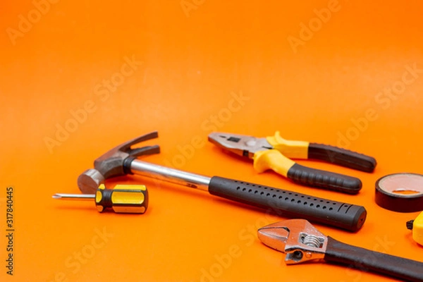 Obraz Mechanic kit tools are on orange background