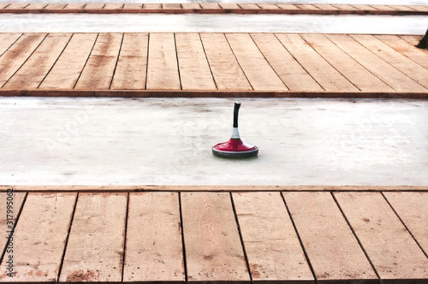 Fototapeta Eistockschießbahnen und ein Turnierstock