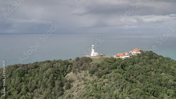 Fototapeta Air view of Byron Bay Lighthouse in moody weather