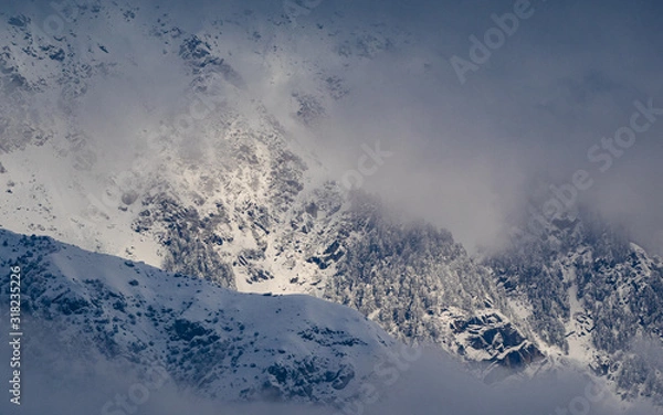 Obraz Light play in the snow dusted mountains