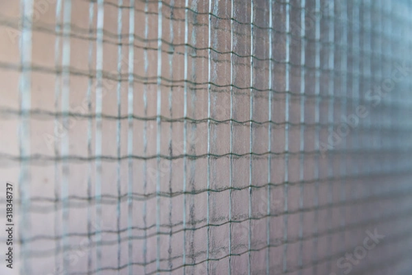 Obraz Type of glass. Metal mesh in the glass.