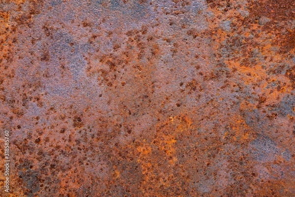 Fototapeta The metal surface is filled with rust that is reddish brown. .Gives a retro and vintage feel.