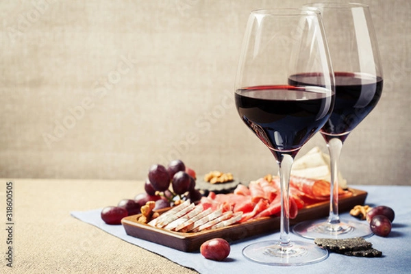 Fototapeta Red wine and charcuterie assortment