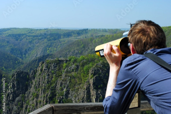 Obraz Tourist takes a closer look