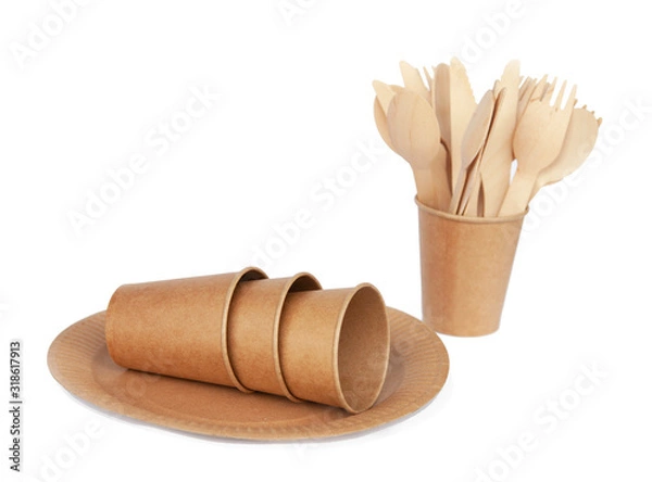 Fototapeta Crockery made from eco kraft paper, paper cups, dishes, bag, fast food containers isolated on white background. Recycling concept. Zero waste. Close-up...