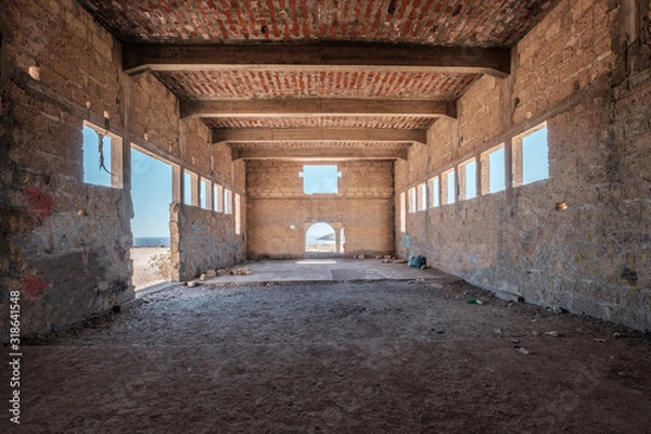 Fototapeta  abandoned warehouse or industrial ruin - run down building , empty  room