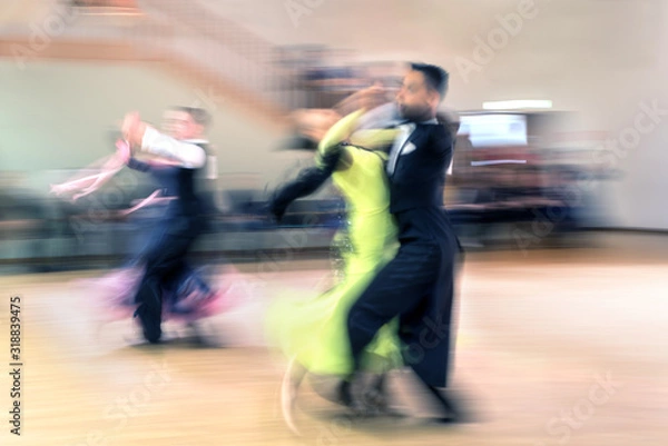 Obraz Two blurry dancing couples in the ballroom