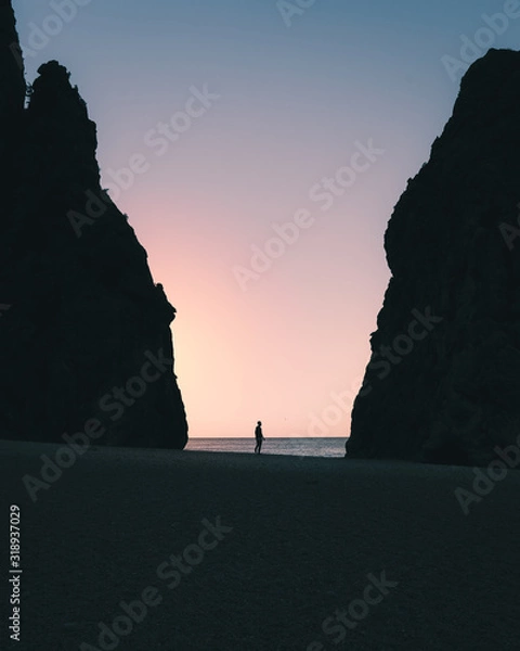 Fototapeta a tiny beach between rocks in Mallorca