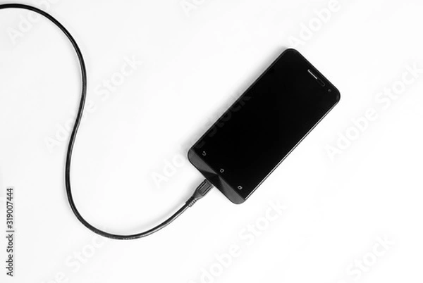 Obraz phone with cable, isolated on a white background