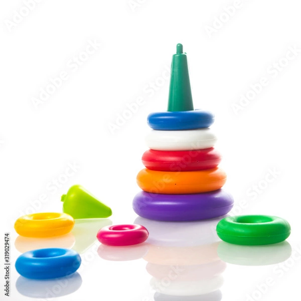 Fototapeta pyramid plastic toy isolated on white background