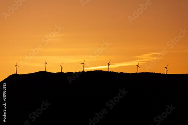 Obraz Wind turbines Silhouettes