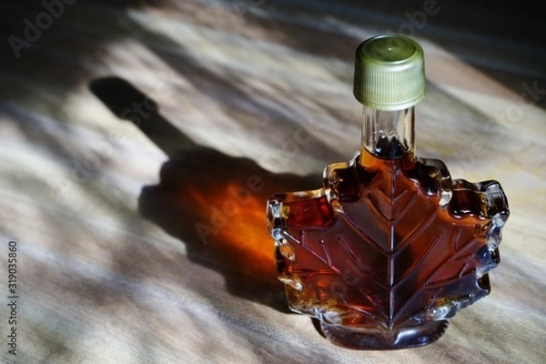 Fototapeta Maple Syrup on Counter