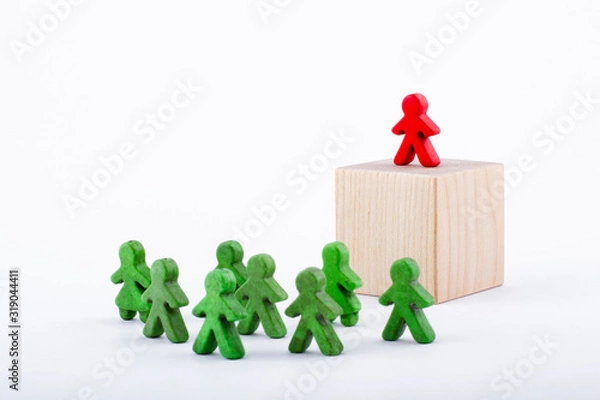 Obraz Successful team leader (manager, CEO, market leader) and another business leading concepts. Standing out from the crowd. Leadership concept.