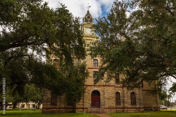 Obraz Built in 1894 of local, rough-cut limestone, the Goliad County (Texas) Courthouse is still in active use today