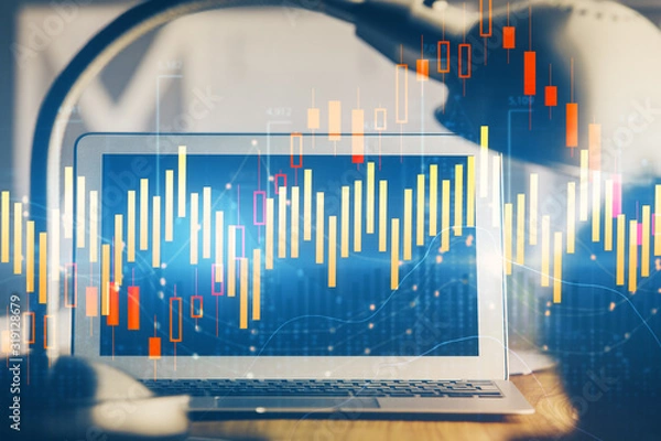 Fototapeta Forex market chart hologram and personal computer background. Multi exposure. Concept of investment.