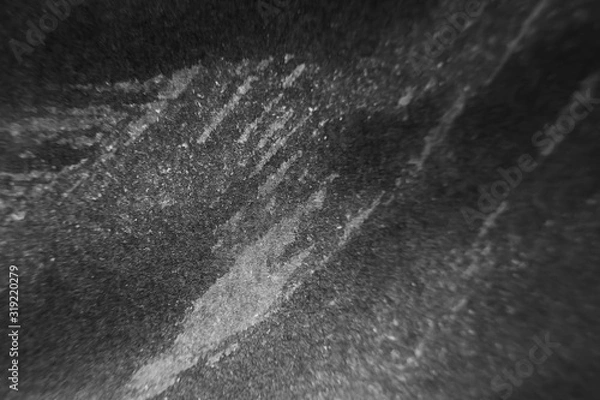 Fototapeta Black abstract minimalistic background. Smears of artistic ink on paper.