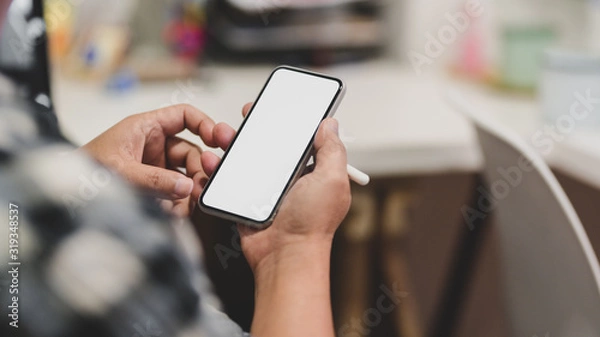 Fototapeta Cropped shot of a man using blank screen smartphone